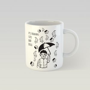 Designový hrnek - it's raining cats and dogs right now